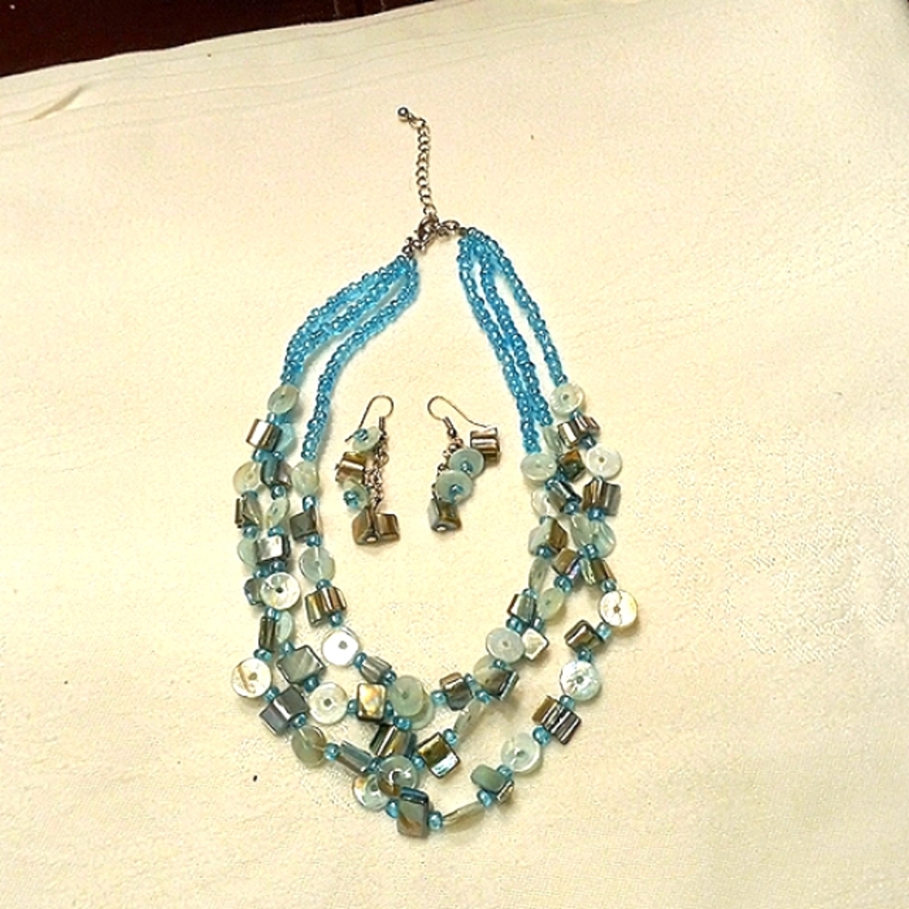 Three strand aqua bead necklace and earrings